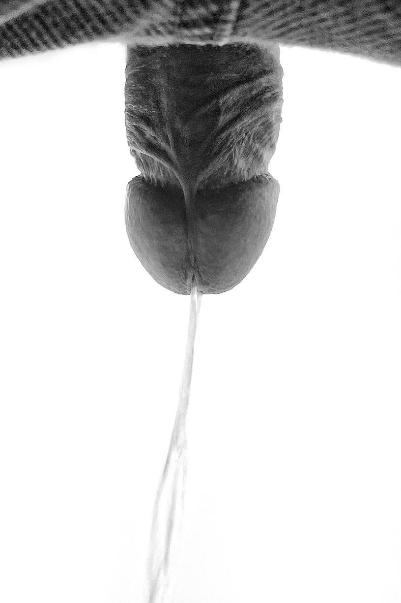 View from below of peeing penis